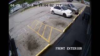 Surveillance video shows crash involving a KCSO officer, van with kids inside