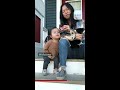 cute toddler begs mom for chocolate