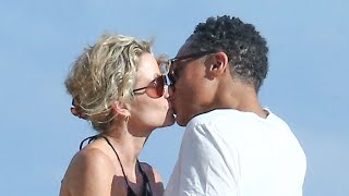 Amy Robach and TJ Holmes 'Going Strong' as They KISS in Miami! (Source)