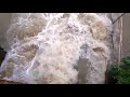 dangerous high tide in a small canal near magura