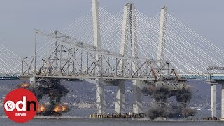 New York bridge plunges into Hudson River after controlled explosion