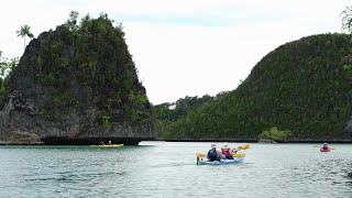 Kayaking Among Islands Stock Video