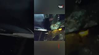 Police bodycam footage captures moment woman rescued from burning vehicle