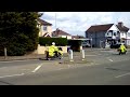 two wiltshire police motorcycles passing swindon fire station