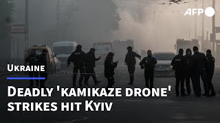 Deadly 'kamikaze drone' strikes hit Kyiv as police fire back | AFP