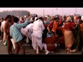 thousands of indian devotees throng the banks of holy river ganges at mouth of bay of bengal