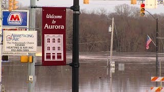 Floodwaters begin to recede in Aurora