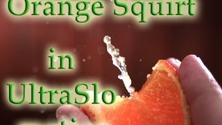 Squeezing An Orange in slow motion