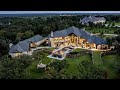 This $5.5M Transitional Masterpiece with over 12,000 SF of living unlike any residence in Oklahoma