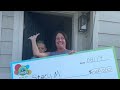 prize surprise teacher stacy m. surprised at home with $500 000 bonus draw check