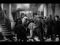 Sabotage (1936) by Alfred Hitchcock, Clip:Hitchcock cameo: Outside the Bijou theatre, Hitch flits by