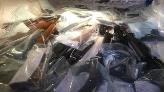 Miami-Dade Police Arrest Couple & Seize Over 30 Guns, Array Of Drugs