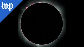 Watch the moment a hybrid solar eclipse reaches totality