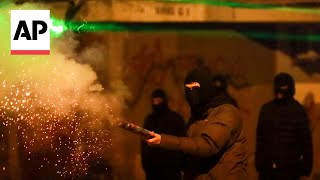 Protesters use fireworks against riot police in Tbilisi, Georgia