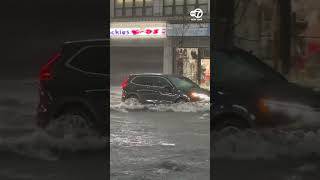 Queens drivers push through flooding after intense rainfall