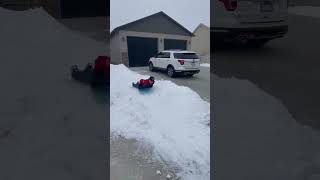 We built a sledding hill in our front yard!