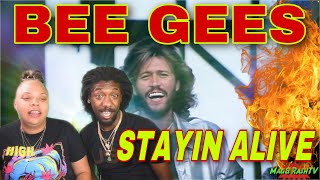 FIRST TIME HEARING Bee Gees - Stayin' Alive (Official Music Video) REACTION #BeeGees