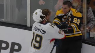 Joe Thornton going at it with Tomáš Nosek during a scrum between the Bruins and Panthers