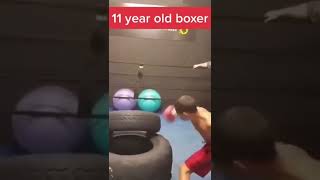 Young 11 year old boxer 🥊 in training 🐺 #boxing Punching stacked tires 🛞 with crazy combos