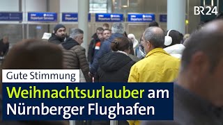 Ab in den Süden: Weihnachtsurlauber am Nürnberger Flughafen | BR24