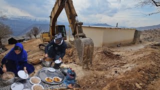 The arrival of the backhoe to build Hojjat and Farzaneh's new house.