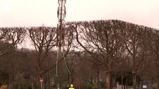 WEB EXTRA: Helicopter Places Antenna On Eiffel Tower