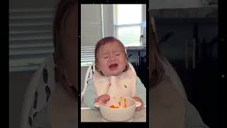 Baby’s first food 🍱 #baby #eat #happy #toddler #reaction #babiesoftiktok #funny kid #moments