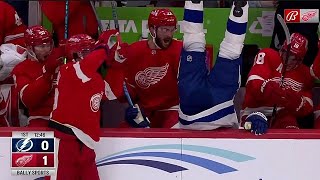 Lucas Raymond Hits Michael Eyssimont Into Red Wings Bench