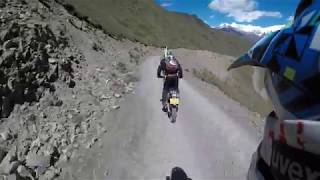 Wild China: Off-road bikes around Mount Gongga (7,500 meters), China. Driving at 4,700 meters alt.