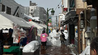 Drinking too much sake at the heavy snow Tokaichi market in Aizuwakamatsu