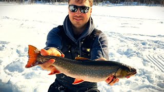 Ice fishing Brook trout at Barbe Lake, Manitoba