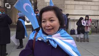 Uyghur activists protest outside Foreign Office