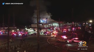 5-alarm fire races through commercial building on Long Island