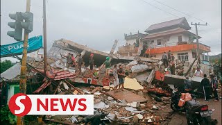 Search underway after strong quake kills at least seven in Indonesia