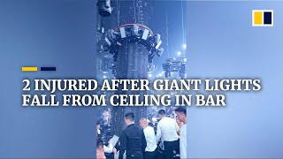 2 injured after giant lights fall from ceiling in bar in China