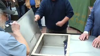 See what's inside a 35-year-old time capsule buried in a Chicago suburb in 1991