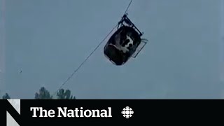 8 rescued from dangling cable car in Pakistan