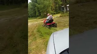 Scaring Dad Right off His Lawnmower || ViralHog