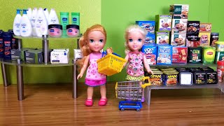 Elsa and Anna toddler at the store - shopping - food - supermarket - hide and seek