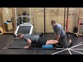 nordic hamstring curl demonstration for proximal hamstring tendinopathy with physiotherapist