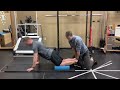 nordic hamstring curl demonstration for proximal hamstring tendinopathy with physiotherapist