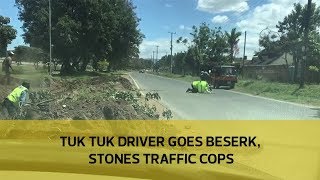 Tuk Tuk driver goes berserk, stones traffic cops
