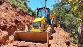 RETROESCAVADEIRA NEW HOLLAND B95B ABRINDO ESTRADA. #newhollandtractor #extremo #estrada