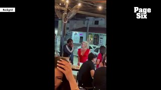 Britney Spears appears to suffer wardrobe malfunction as she dances at a bar in Cabo