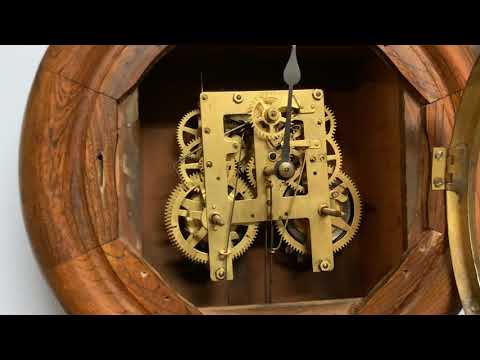 What is an antique regulator clock?