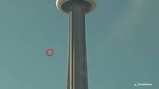 CN tower in Toronto caught this fireball like object aka meteor in sky