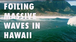 Amazing tow foiling massive waves on Kauai