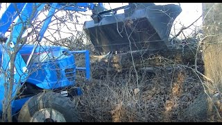 Retrieving A Oak Log From A Dozer Pile