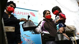 Trabajadoras sexuales peruanas organizan olla común para sobrevivir bajo pandemia | AFP