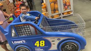 Enoch on racing cart at Lowe’s